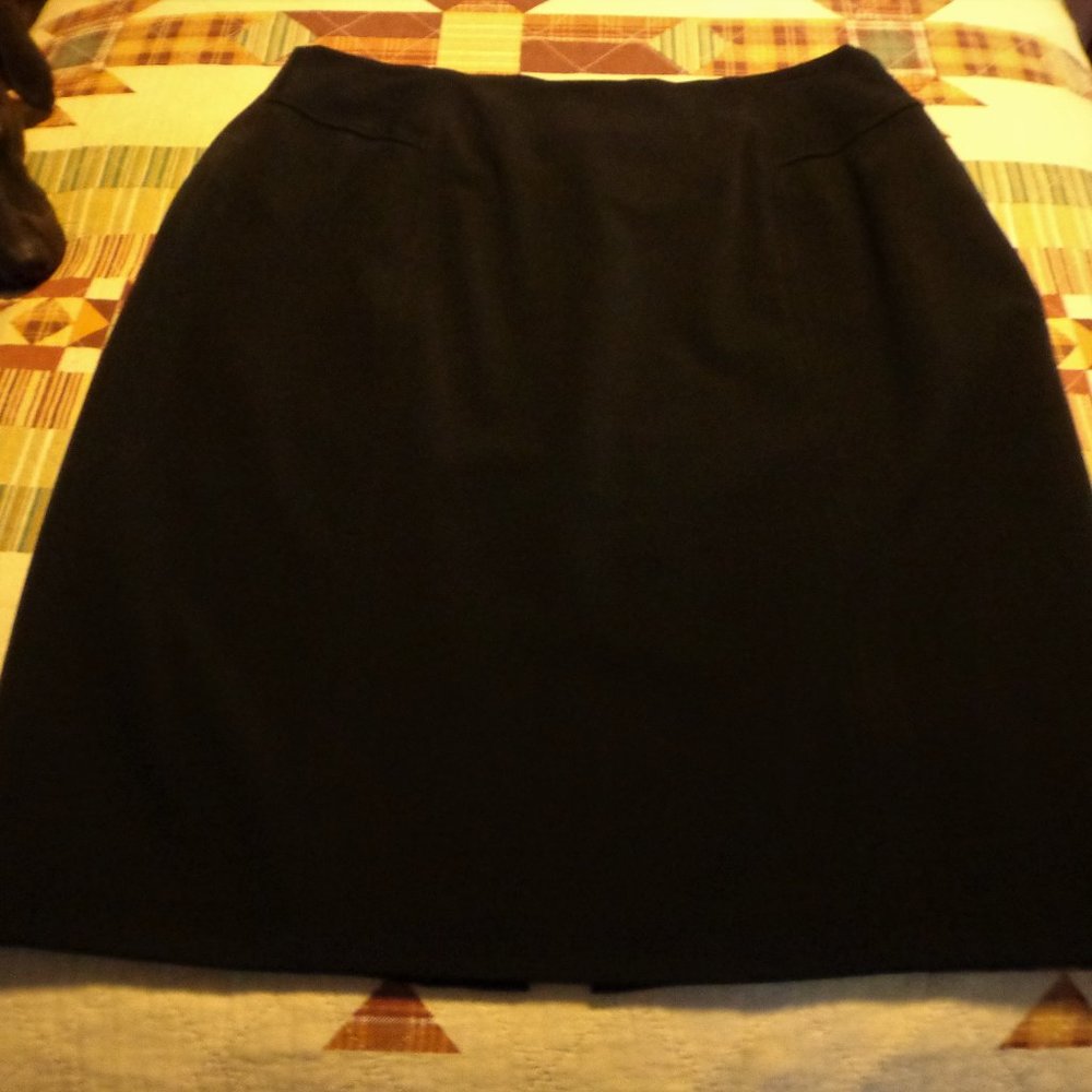 Black knee-length skirt